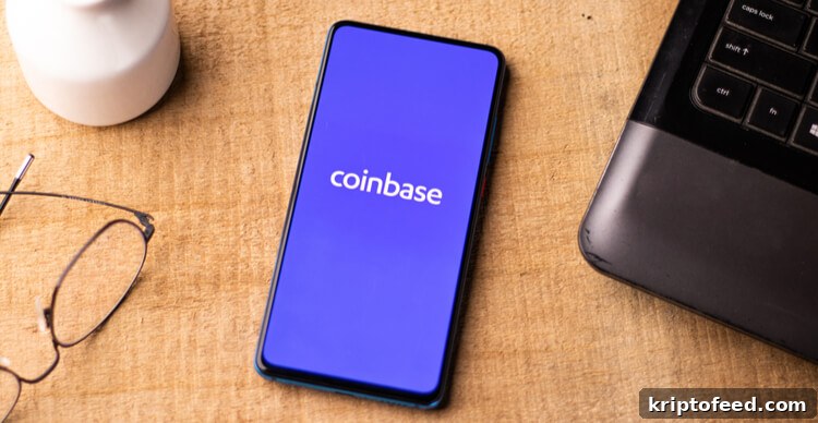 This Week in Crypto: Market Cap Hits $2 Trillion 2 Coinbase logo on a smartphone on a desk